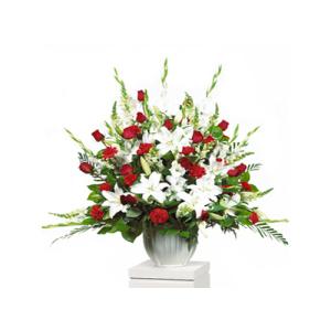 Contenedor tradicional rojo y blanco de CARISMA FLORISTS®