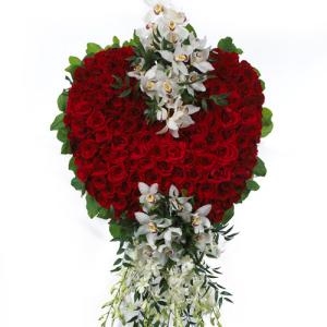 Cœur de roses rouges CARISMA FLORISTS®